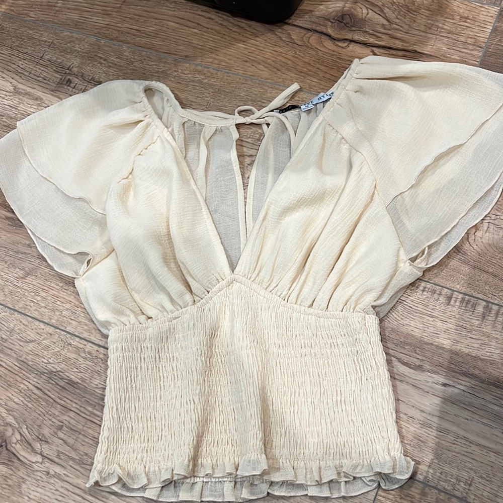 Tan women’s top